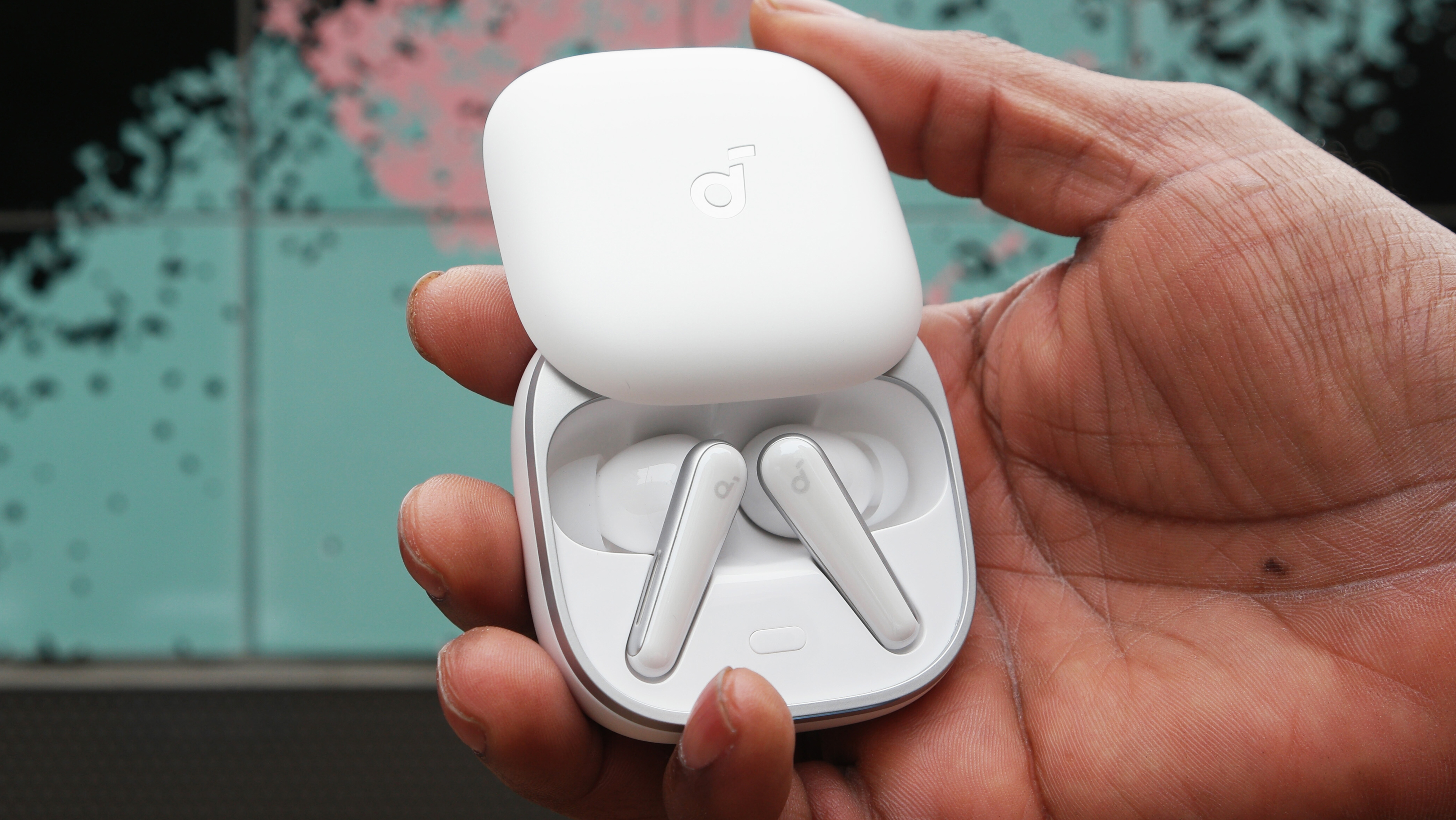 Soundcore Liberty 5 shown with the case open, in white