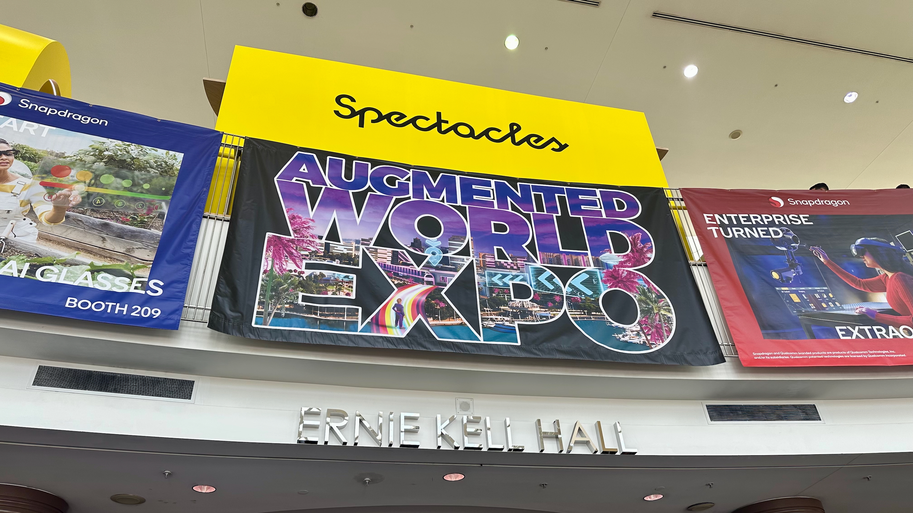 A photo of the Augmented World Expo sign at the entrance of Ernie Kell Hall convention center in Long Beach.